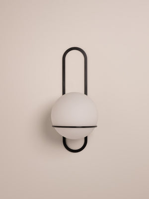 Cradle wall sconce shown in blackened steel finish, front view
