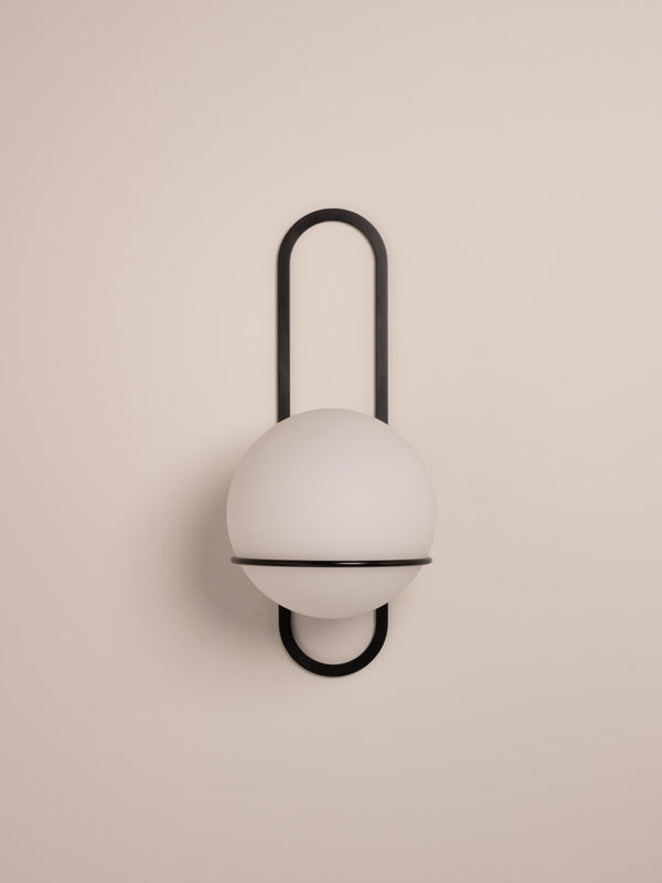 Cradle wall sconce shown in blackened steel finish, front view