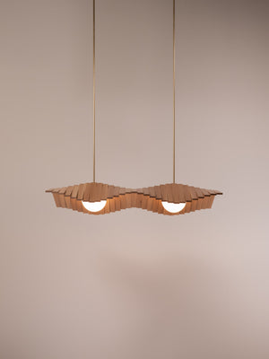 Wave II chandelier shown in natural oak and natural brass finishes, front view, illuminated
